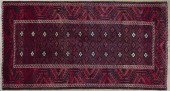 A Balouch Wool Rug having an o