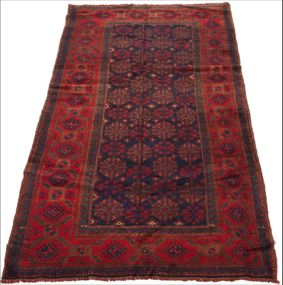 A Balutch Carpet Palace runner very