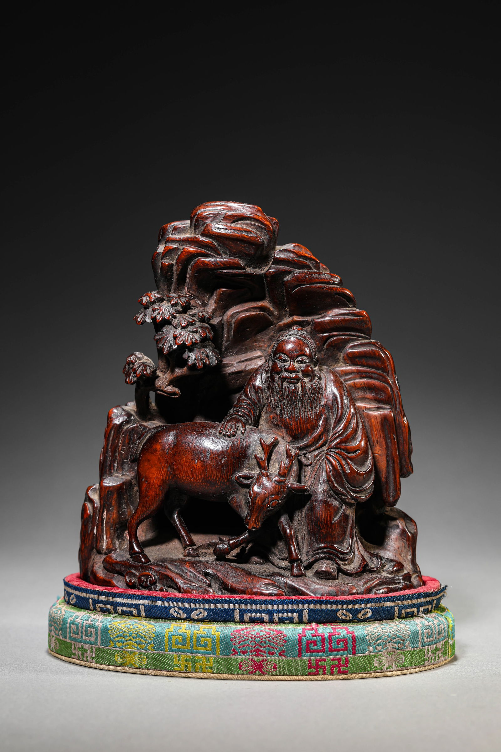 A BAMBOO CARVED 'SCHOLAR UNDER PINE