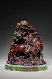 A BAMBOO CARVED 'SCHOLAR UNDER