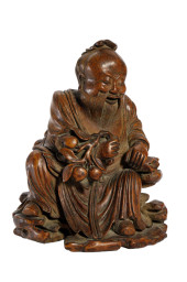 A BAMBOO CARVING SEATED BUDDHA