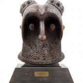 A Bamileke Carved Wood Helmet