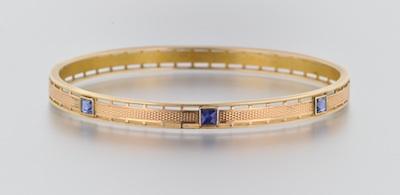 A Bangle Bracelet with Blue Spinels
