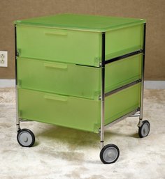 A bank of three green plastic