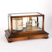 A barograph in an oak case, 36