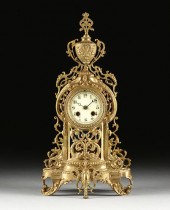A BAROQUE REVIVAL GILT BRASS M