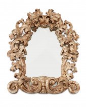 A BAROQUE STRIPPED CARVED WOOD