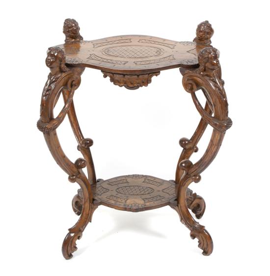 A Baroque Style Carved Walnut