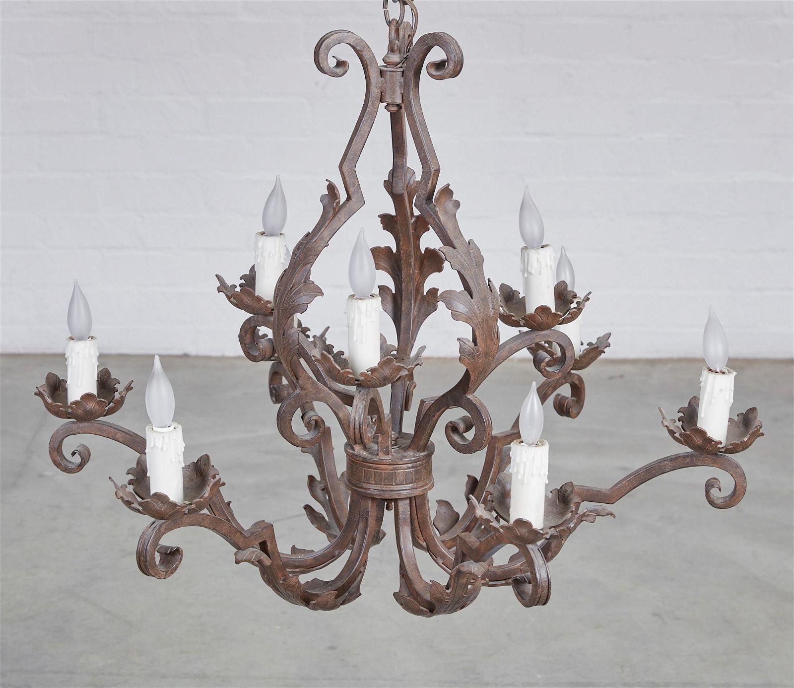 A BAROQUE STYLE IRON NINE LIGHT