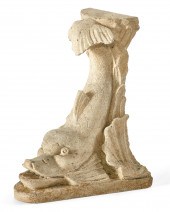 A BAROQUE STYLE LIMESTONE DOLP