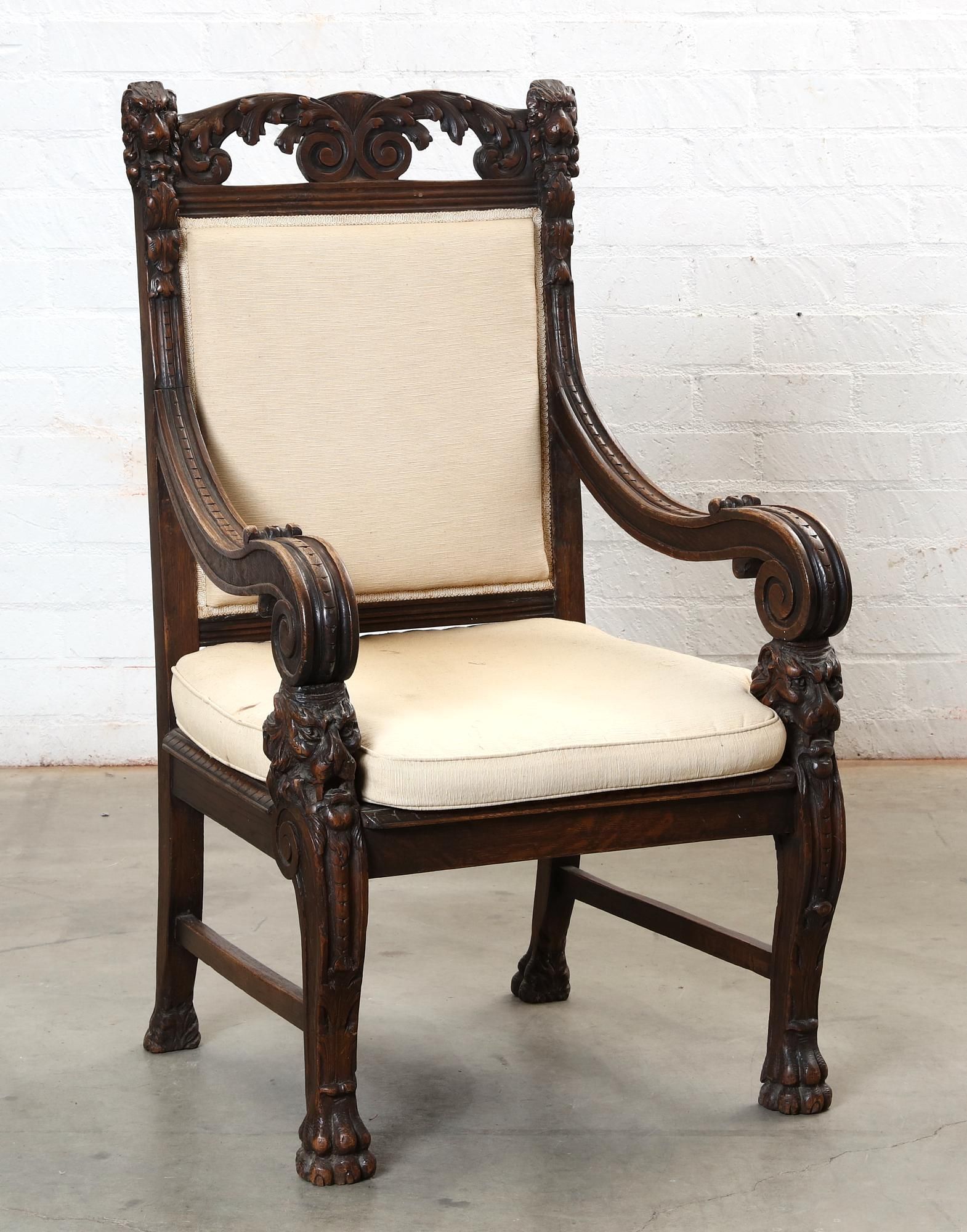 A BAROQUE STYLE OAK ARMCHAIRA