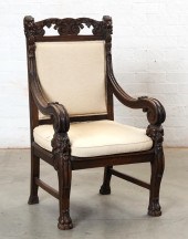 A BAROQUE STYLE OAK ARMCHAIRA