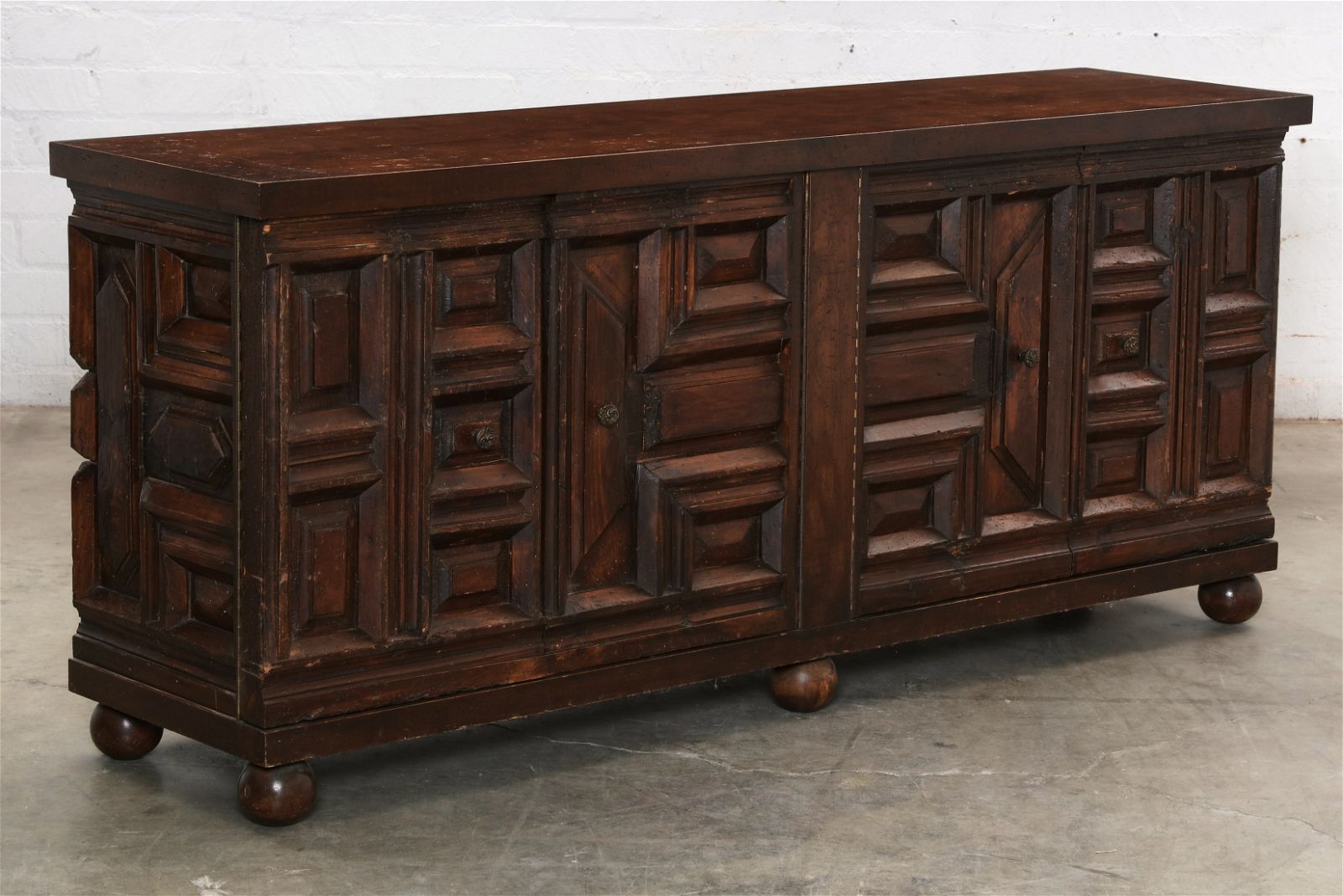 A BAROQUE STYLE RUSTIC STAINED WOOD