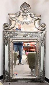 A BAROQUE STYLE SILVERED CAST-