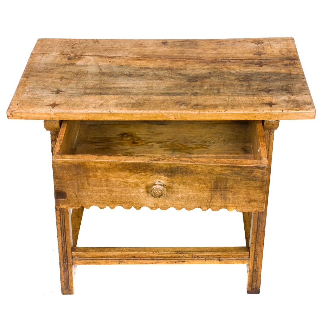 A BAROQUE STYLE TABLE A Baroque