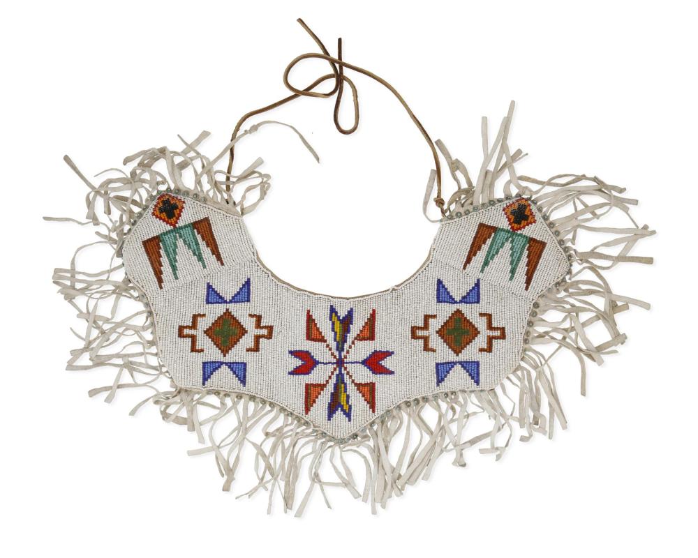 A BEADED HIDE DRESS YOKEA beaded