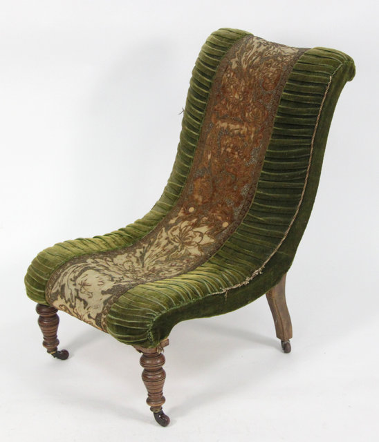 A beech framed nursing chair on