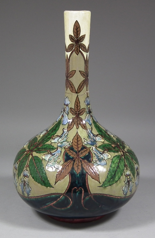 A Belgian pottery bottle shaped