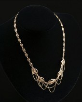 A BELLE ÉPOQUE 18K YELLOW GOLD