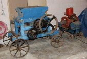 A belt driven apple press with