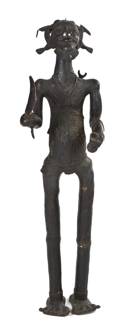 A Benin Style Bronze Statue