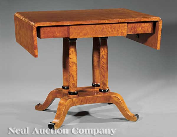 A Biedermeier Maple and Ebonized