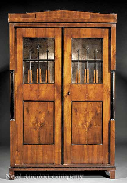 A Biedermeier Walnut and Ebonized