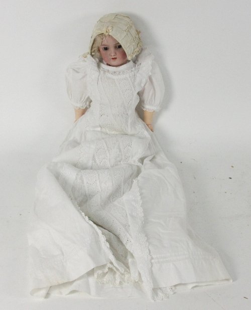 A bisque head doll by Simon