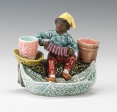 A Black Americana Majolica Mat