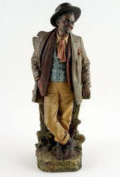 A BLACK AMERICANA PLASTER FIGU