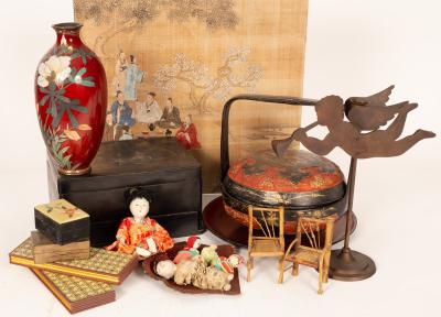 A black and gold lacquer workbox