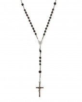 A BLACK BEAD ROSARY BELONGING