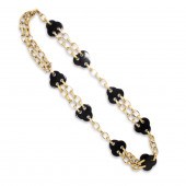 A BLACK CHALCEDONY AND METAL B