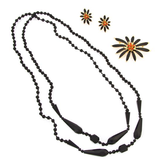 A Black Enamel and Faux Coral Suite