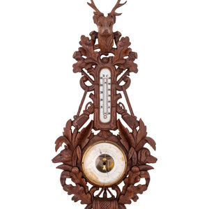 A Black Forest Carved Barometer and