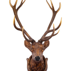 A Black Forest Carved Stag Head