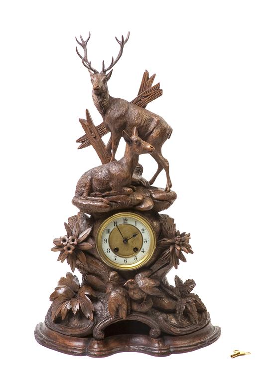 A Black Forest Carved Wood Mantel