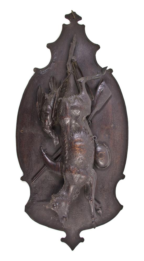 A Black Forest Carved Wood Trophy