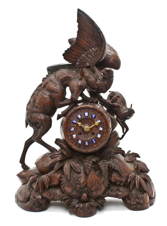 A Black Forest Carved Wood Mantel