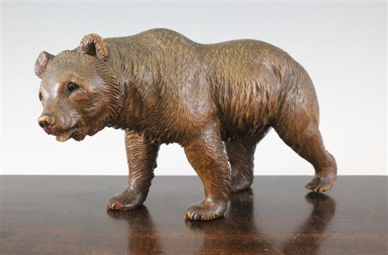 A Black Forest carved wood model of