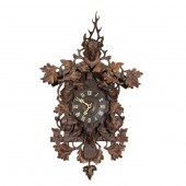 A BLACK FOREST HIGHLY CARVED C