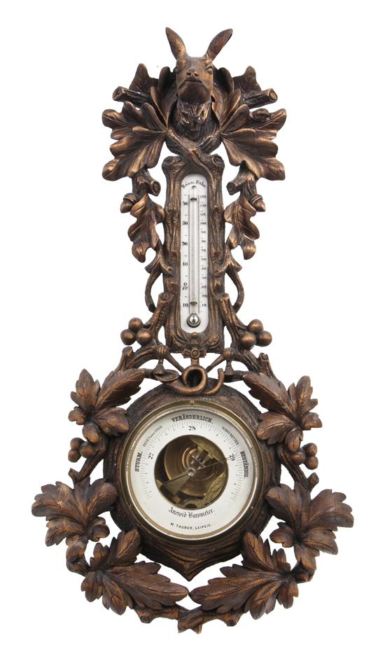 A Black Forest Wheel Barometer M.