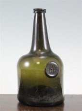 A black glass sealed wine bott