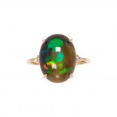 A BLACK OPAL, DIAMOND AND FOUR