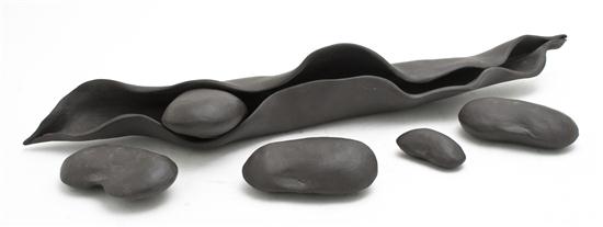 A Black Porcelain Peapod Form