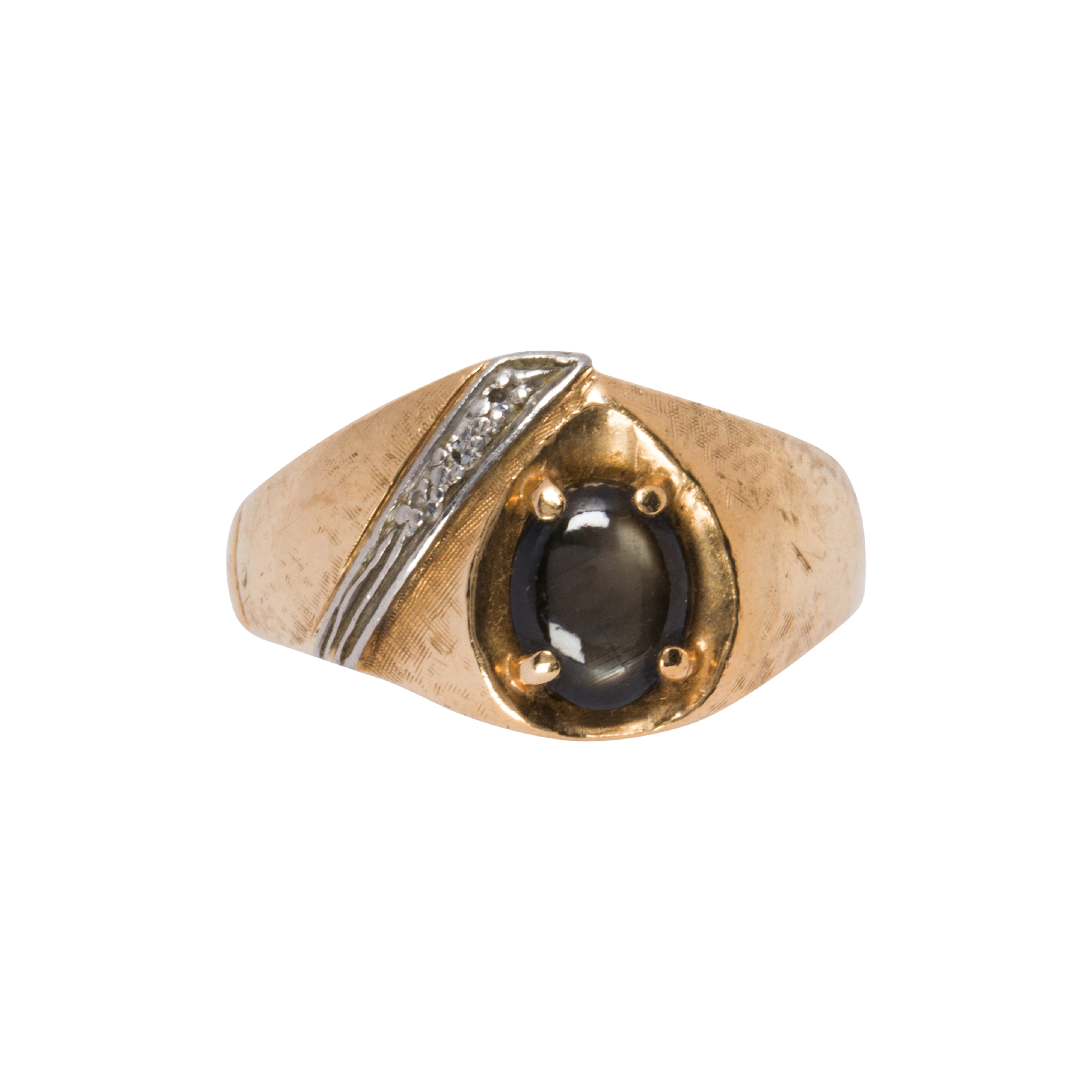 A BLACK STAR SAPPHIRE AND 14K