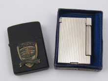 A black Zippo lighter commemorating