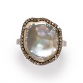 A BLISTER PEARL AND DIAMOND RI