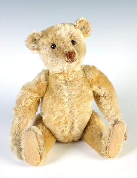 A BLONDE/GOLD STEIFF BEAR WITH