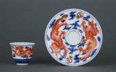 A BLUE AND IRON-RED 'TWO DRAGO